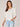 Off White Short Flounce Scallop Sleeve Ruffle Armhole Embroidered Placket Round Neck Woven Top